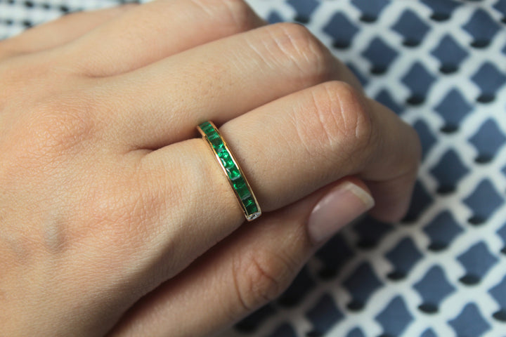 14K gold Emerald Half Band rectangular gemstones worn on finger