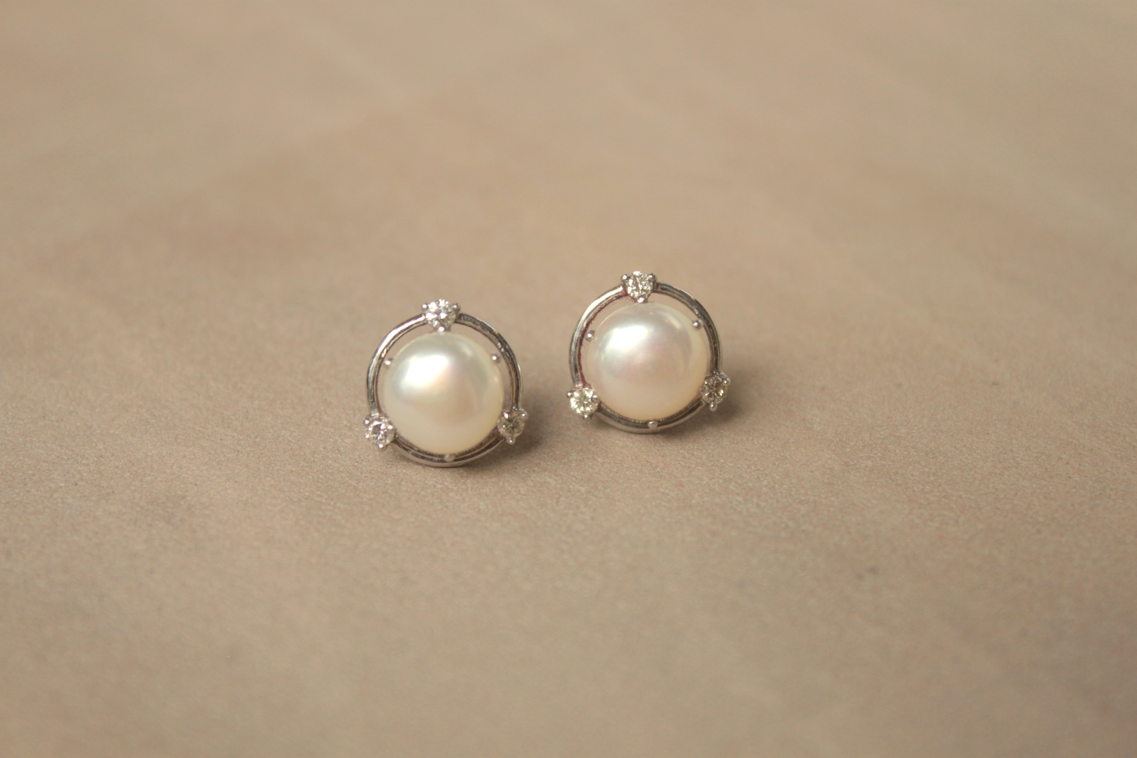 14K gold round pearl stud earrings in silver prongs
