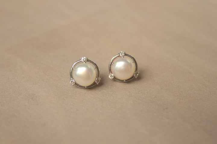 14K gold round pearl stud earrings in silver prongs