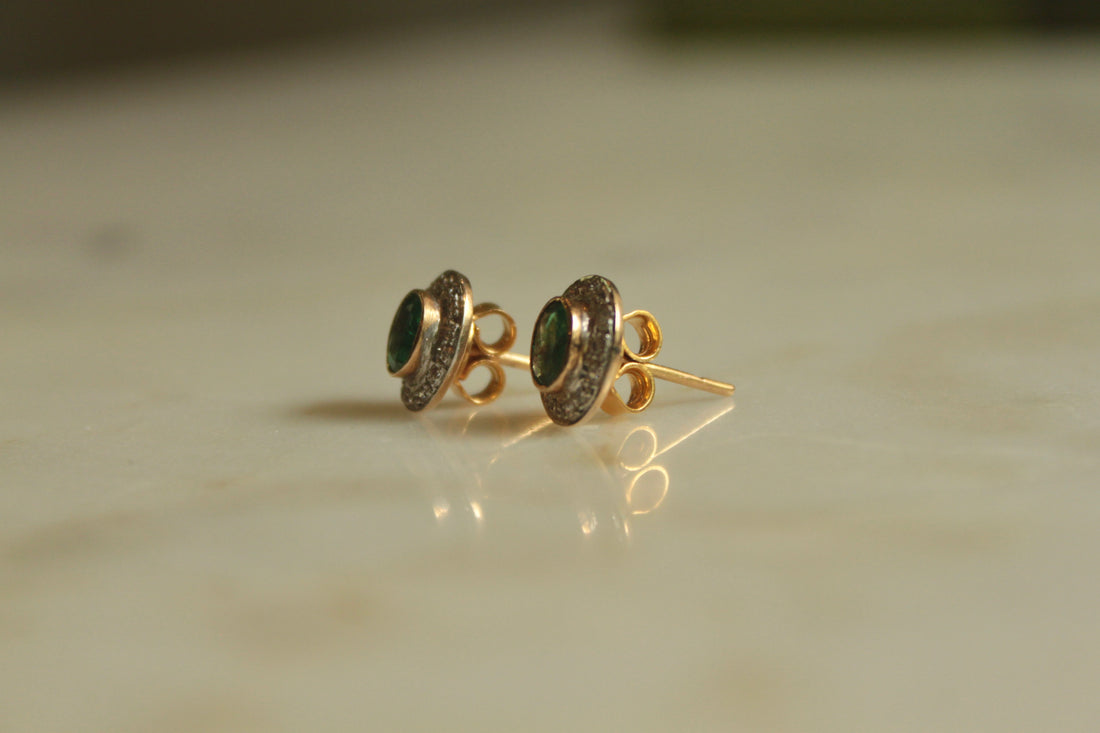 14K gold emerald earrings with diamond halo