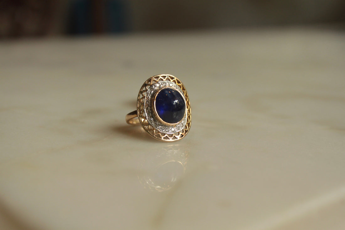 14K gold sapphire ring with filigree band detailing