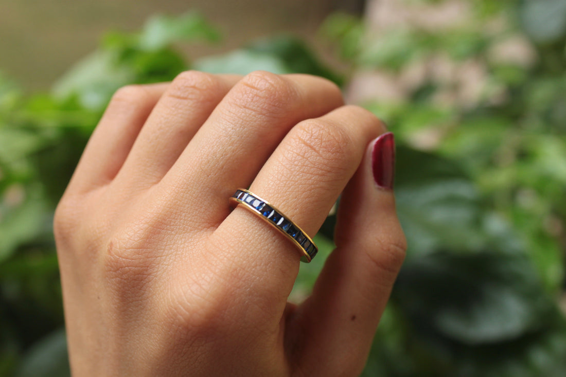 14K gold sapphire eternity band rectangular stones on hand
