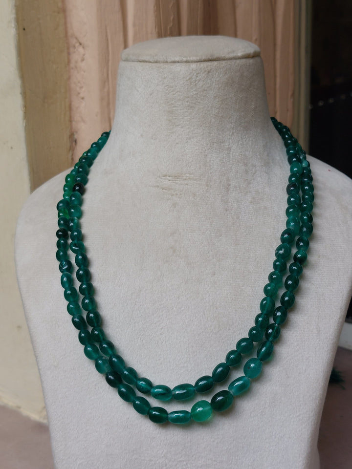 Green onyx bead mala close-up detail