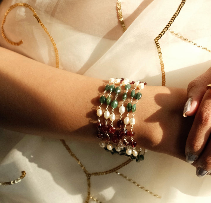 Silver emerald ruby pearl bracelet close-up detail