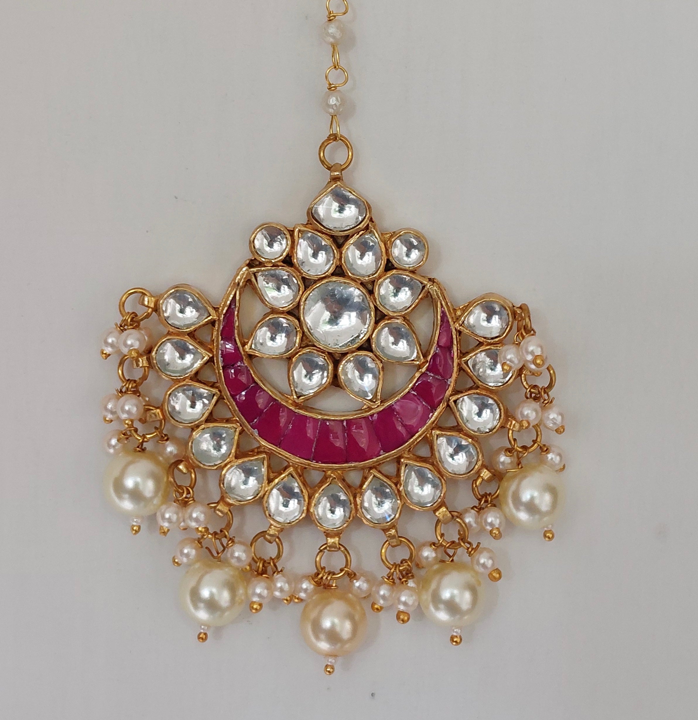 Silver alloy pink kundan tika product photo